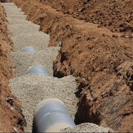 land drainage being implemented in a field
